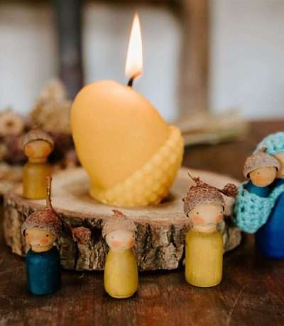 acorn candle lit