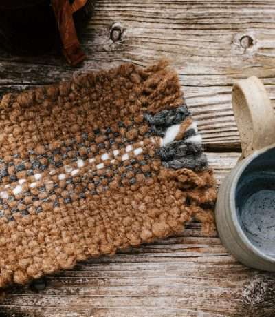 brown grey wool coasters close up