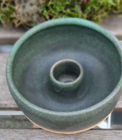 green candle holder close up