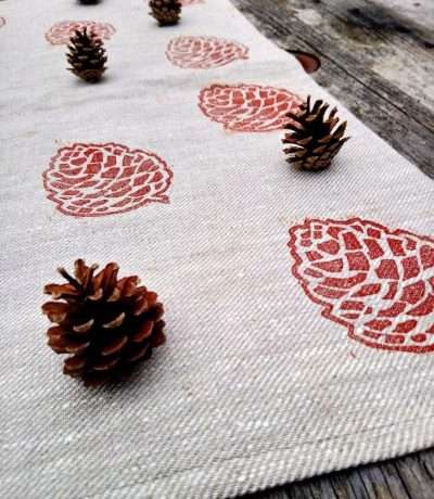 pinecone tea towel open styled shot
