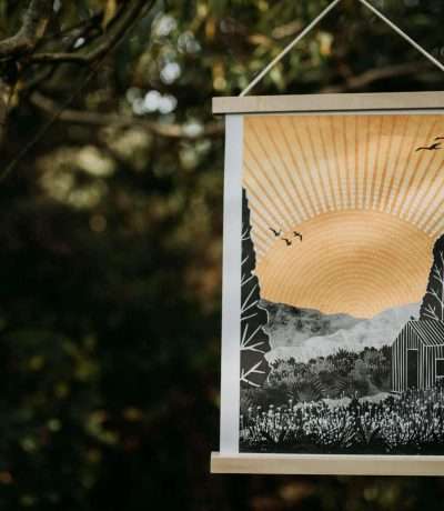 ruth thorp home print hanging in a tree