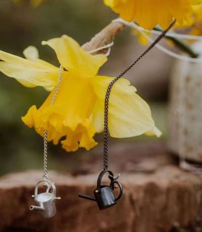 watering can necklaces duo