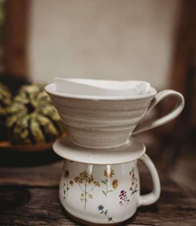 white stoneware coffee dripper