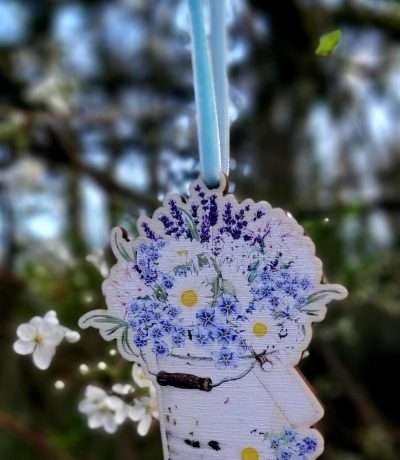 wooden blue flowers in bucket decoration