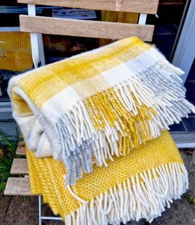 yellow blankets on chair